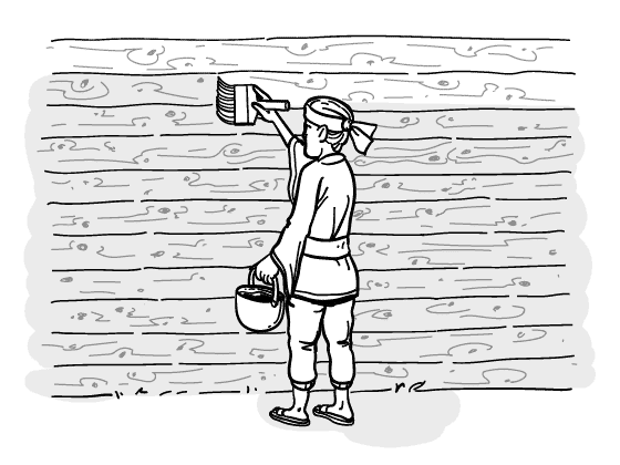 Uomo che dipinge una parete Yakisugi